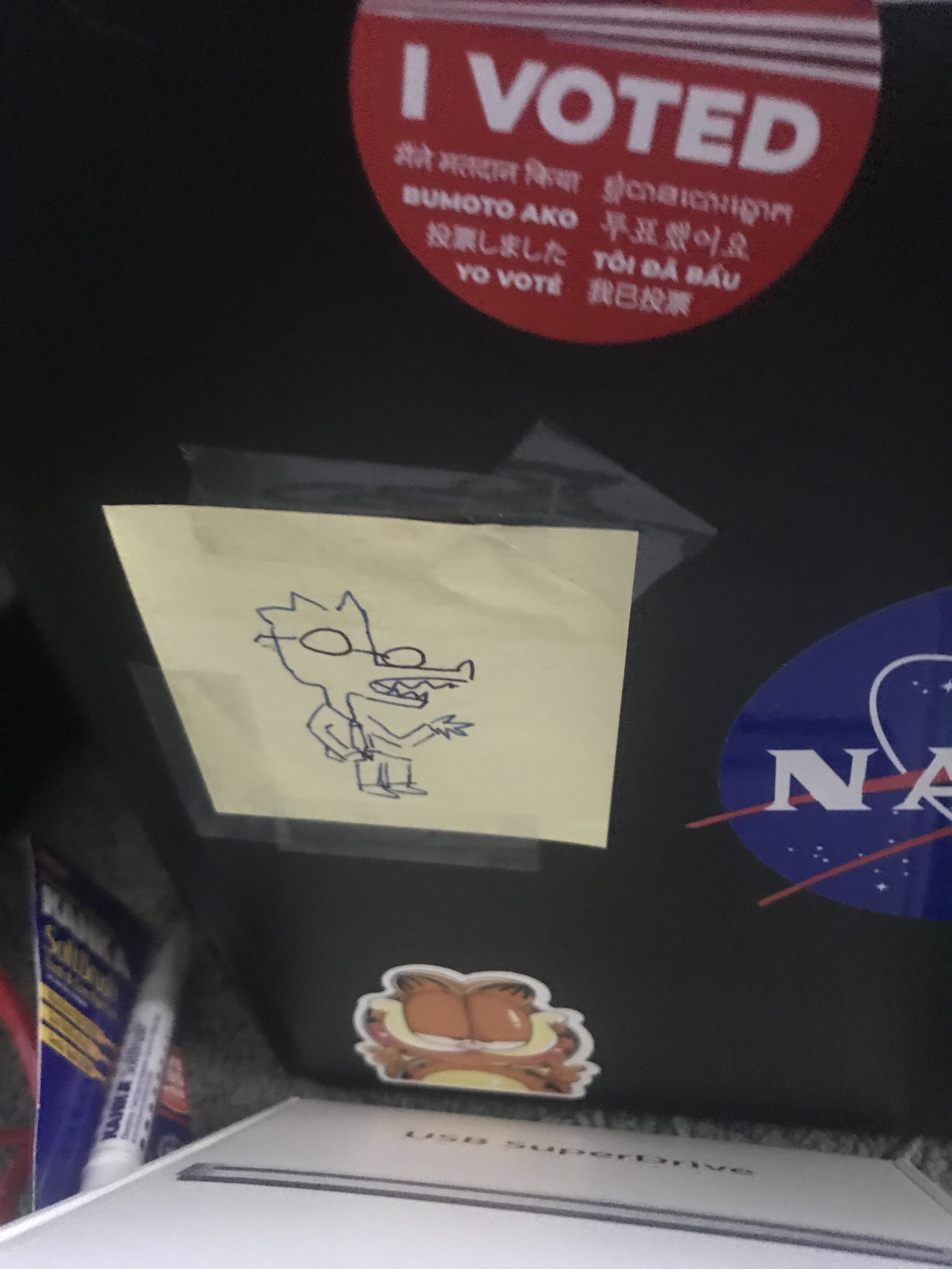 The guest's puppet taped to my computer case